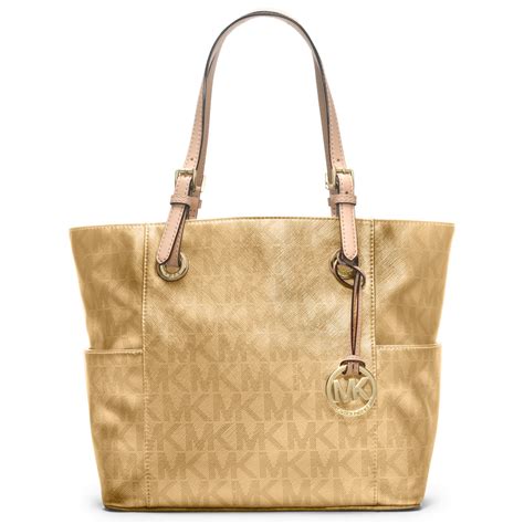 michael kors bags gold color|Michael Kors gold tote bag.